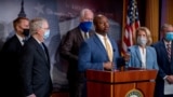 Sen. Tim Scott, R-S.C., center, accompanied by Senate Republicans, speaks at a news conference to announce a Republican police reform bill on Capitol Hill, June 17, 2020, in Washington.