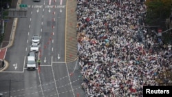 Tens of thousands of South Korean Christians attend a massive worship service in protest of the legislation of anti-discrimination bills and same-sex relationships, in central Seoul, South Korea, Oct. 27, 2024. 