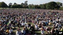 People gather for a vigil in Hagley Park following the March 15 mass shooting in Christchurch, New Zealand, March 24, 2019. 