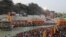 Devotees gather on the banks of Ganges river to pray ahead of the first Shahi Snan at "Kumbh Mela" or the Pitcher Festival, in Haridwar, India, March 10, 2021.