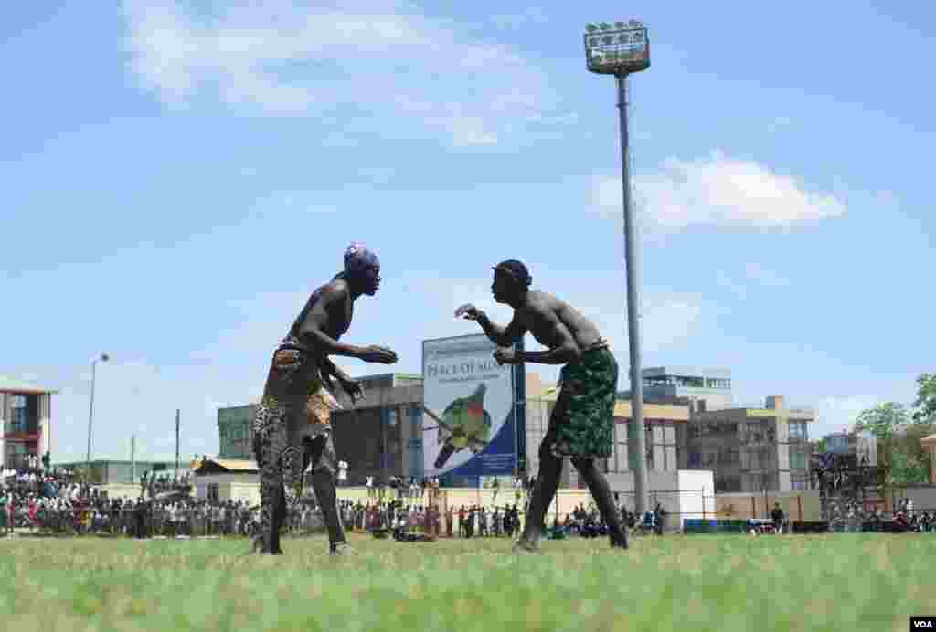 Two wrestlers face off at the "Wrestling for Peace" tournament at Juba Stadium in South Sudan's capital, April 16, 2016. (J. Patinkin/VOA)