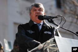 FILE - AFL-CIO President Richard Trumka speaks to union members and other federal employees at a rally to call for an end to the partial government shutdown, Jan. 10, 2019 at AFL-CIO Headquarters in Washington.