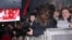 Fans gather ahead of the premiere of the film 'Star Wars: The Last Jedi' in London, Dec. 12, 2017. 
