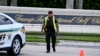 A sheriff's deputy blocks the street outside the Trump International Golf Club in West Palm Beach, Florida, on Sept. 15, 2024.