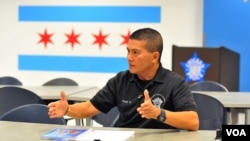 A Thai-American Chicago PD Academy instructor , Officer Trak Silapaduriyang talks with VOA Thai.