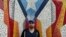 Actor and composer of Puerto Rican descent Lin Manuel Miranda stands in front of a mural in La Placita de Güisin, in Vega Alta, Puerto Rico, Nov. 7, 2017. 