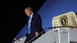 US President Donald Trump steps down from Air Force One upon his arrival in West Palm Beach, Florida, Jan. 31, 2025.