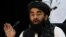 Kepala juru bicara Pemerintah Afghanistan, Zabihullah Mujahid berbicara kepada media di Kabul.