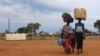 South Sudan refugees family arrives at the U.N. High Commissioner for Refugees-managed refugee reception point at Elegu, in Amuru district of the northern region near the South Sudan-Uganda border, Aug. 20, 2016. 