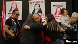 Native American activist Leonard Peltier, imprisoned for decades for the murder of two FBI agents, hugs a relative in Belcourt, North Dakota, on Feb. 19, 2025, a day after leaving prison following former U.S. President Joe Biden's commutation of his sentence to house arrest.