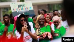 FILE - Nigerian youths gather to protest climate change and poor environmental practices, in Abuja, Nigeria, Sept. 20, 2019.