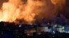 Api dan asap mengepul selama Israel membombardir Gaza dengan serangan udara hari Minggu, 9 Oktober 2023. 