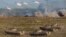 FILE - In this photo released by the Russian Defense Ministry Press Service, a view of the joint strategic exercise of the armed forces of the Russian Federation and the Republic of Belarus Zapad-2021.