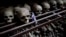 FILE - In this Sept. 27, 2009 photo, skulls and bones from some of the estimated 10,000 Tutsis killed in a two-day massacre at Nyamata church during the 1994 genocide, are displayed in a crypt behind the church, now a memorial to the genocide, in the town