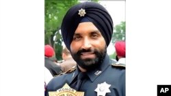 This photo provided by Harris County Sheriff's office shows Deputy Sandeep Dhaliwal. Dhaliwal was shot and killed while making a traffic stop, Sept. 27, 2019 near Houston, Texas. 