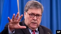 FILE - Attorney General William Barr speaks during a news conference at the Justice Department in Washington, Dec. 21, 2020.