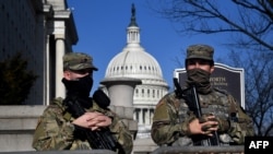 US National Guard soldiers provide security at the US Capitol in Washington, DC.