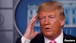 President Donald Trump answers a question during a news conference on the coronavirus outbreak, at the White House in Washington, Feb. 26, 2020.