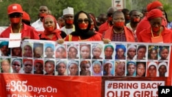 Manifestation marquant l'anniversaire de l'enlèvement massif de jeunes filles à Chibok au Nigéria (AP Photo/Sunday Alamba)