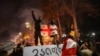 Protesters clash with police during a demonstration against the government's decision to delay European Union membership talks amid a post-election crisis, outside the Georgia Parliament in Tbilisi, Georgia, early on Dec. 1, 2024. 