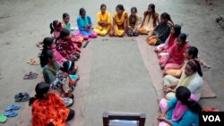 Bangladeshi girls meeting about menstruation, reproductive health, HIV/AIDS
