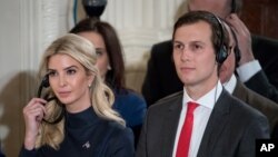 FILE - Ivanka Trump, the daughter of President Donald Trump, and President Donald Trump's White House Senior Advisor Jared Kushner attend a joint news conference with President Donald Trump and German Chancellor Angela Merkel in the East Room of the White House.