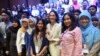 FILE - Then-French ambassador to Indonesia Corinne Breuze (C) poses with Indonesian students leaving for France to further their university education, during an event organized by the French Institute in Jakarta, July 12, 2016.