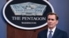 FILE - Pentagon spokesman John Kirby speaks to reporters on Feb. 17, 2021. He said on March 3 that Iraqi security forces were leading the investigation of the attack on the al-Asad base, adding that it was still too early for any attribution.