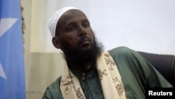 FILE - Former al-Shabab leader Mukhtar Robow Abu Mansur attends a news conference in Mogadishu, Somalia, Aug. 15, 2017. 