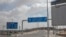 This March 19, 2020 photo, shows an empty road leading to departures at the Cairo International Airport during a travel ban due to the coronavirus outbreak, in Cairo, Egypt.
