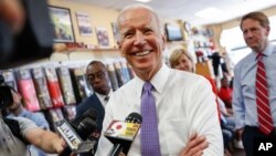 FILE - Former Vice President Joe Biden speaks to the media in Cincinnati, Ohio, June 29, 2018. 