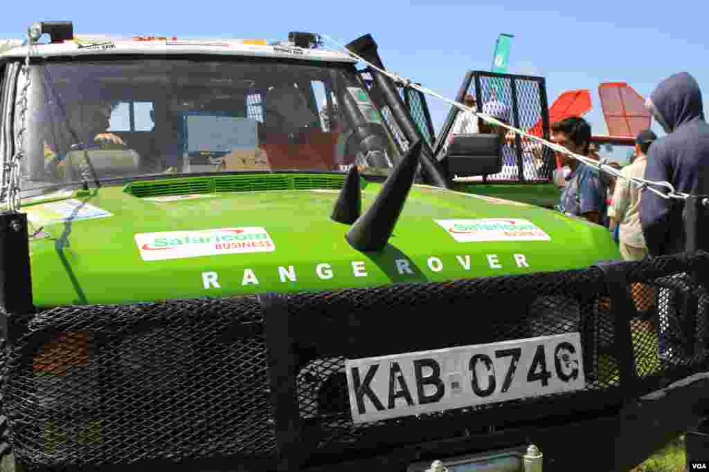 A charge car decked out with rhino horns gets ready to participate in the 28th annual Rhino Charge, held this year in the rocky terrain of Narok county, Kenya, May 29, 2016. The event began in 1989, through the Rhino Ark charitable trust, to raise money for the conservation of the Aberdares mountain ecosystem, later expanding to help Mount Kenya and the Mau Forests Complex. (J. Craig/VOA)