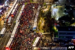 Pro-Yoon supporters gather outside the Seoul Western District Court in Seoul, South Korea, Jan. 18, 2025.