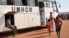 FILE - Newly arrived Sudanese refugees board buses to be taken to other camps in the area, in Yida, South Sudan, Feb. 20, 2018.