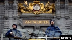 Belgian police officers patrol central station, in Antwerp, Belgium March 3, 2017. 