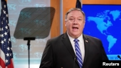 FILE - U.S. Secretary of State Mike Pompeo speaks during a media briefing at the State Department in Washington, May 6, 2020.