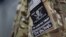 Patches on the sleeve of a militiaman are seen at the Malheur National Wildlife Refuge near Burns, Oregon, site of a takeover by self-styled militiamen who were protesting the federal government's role in governing wild lands, Jan. 4, 2016.