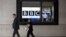 Screens showing broadcasts are seen through a window at the BBC headquarters of New Broadcasting House in London, November 12, 2012. 