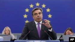 FILE - European Commission vice-president Margaritis Schinas delivers a speech on the speedy adoption of the asylum and migration package Wednesday, Oct. 4, 2023 in Strasbourg, eastern France. 