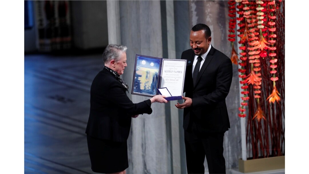 FILE - Ethiopian Prime Minister Abiy Ahmed Ali receives medal and diploma from Chair of the Nobel Comittee Berit Reiss-Andersen during the Nobel Peace Prize awarding ceremony in Oslo City Hall, Norway.