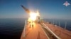 In this photo made from video provided by the Russian Defense Ministry Press Service on March 28, 2023, a Russian navy boat launches an anti-ship missile test in the Peter The Great Gulf in the Sea of Japan.