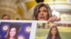 Sen. Joni Ernst, R-Iowa, holds a poster with photos of murder victims Sarah Root and Laken Riley as she speaks after a policy luncheon on Capitol Hill, Feb. 27, 2024, in Washington.