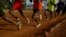 FILE: Athletes exercise in the early morning in the sports ground of the University of Eldoret in western Kenya, March 21, 2016. 