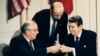 FILE - U.S. President Ronald Reagan (R) and Soviet leader Mikhail Gorbachev exchange pens during the Intermediate Range Nuclear Forces Treaty signing ceremony in the White House East Room in Washington, D.C., Dec. 8, 1987. 