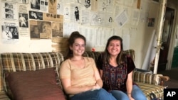 FILE - Haley Robertson, editor of the Daily Orange, left, and managing editor Catherine Leffert lead the student-run newspaper that has covered Syracuse University since 1903, and trained generations of journalists, in Syracuse, N.Y., Sept. 13, 2019.