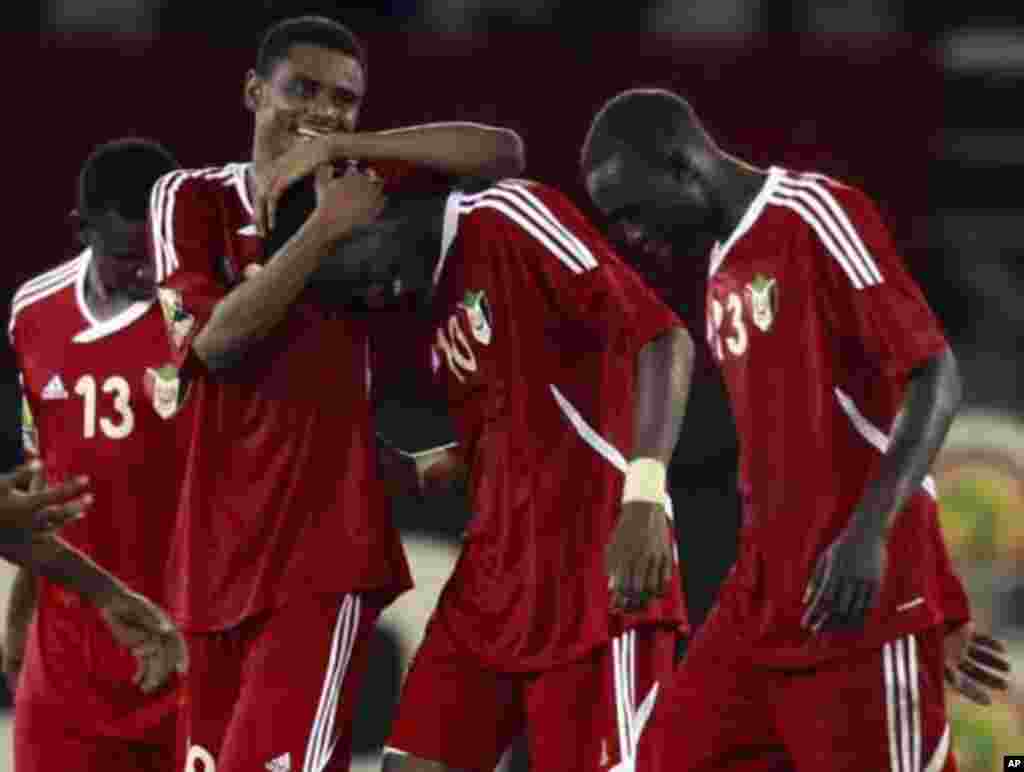 Sudan's players celebrate after winning their African Nations Cup Group B soccer match against Burkina Faso at Estadio de Bata "Bata Stadium", in Bata January 30, 2012.