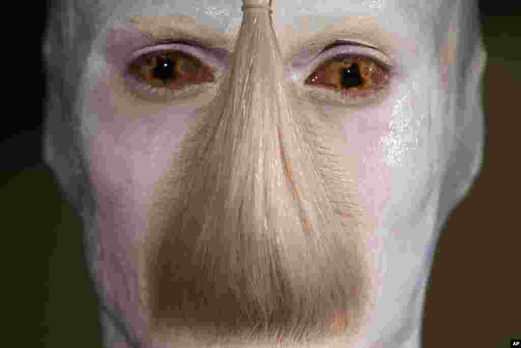 A model presents a creation of designer Patrick Mohr at the Mercedes Benz Fashion Week for autumn winter 2013 in Berlin, Germany.