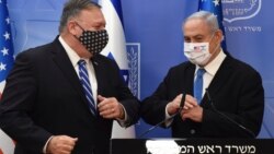 U.S. Secretary of State Mike Pompeo and Israeli Prime Minister Benjamin Netanyahu wear face masks to help prevent the spread of the coronavirus after they make joint statements to the press, in Jerusalem, Aug. 24, 2020.