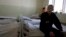 FILE - A inmate sits in the multi-drug resistant tuberculosis [MDR-TB] ward in a prison hospital in the Siberian city of Tomsk, about 3,500 kilometers east of Moscow, Russia.