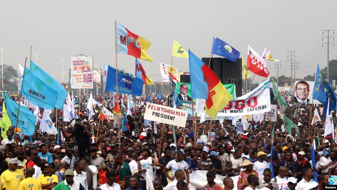 FILE - Supporters of Congolese political parties attend a joint opposition rally in Kinshasa, Democratic Republic of Congo, Sept. 29, 2018. 